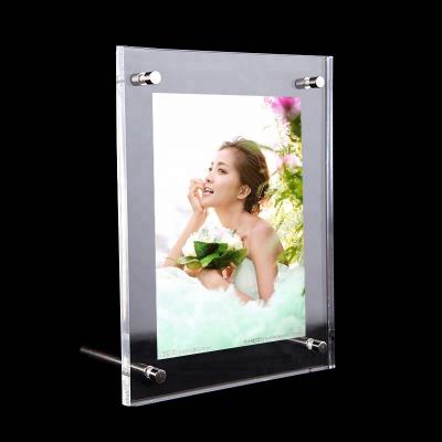 China Fashionable Horizontal Or Vertical Wholesale Clear Tilted Acrylic Photo Frame With Standoff Material for sale