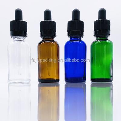 China Luxury Essential Oil Cosmetics Good Reputation 30Ml Round Glass Bottle With Dropper for sale