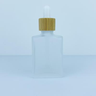 China Essential Oil 10ml 15ml 30ml 50ml Frosted Square Glass Dropper Bottle for sale