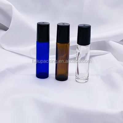 China Essential Oil 10ml Amber Blue Glass Roll On Bottle Essential Oil Bottle Lip Gloss Roller Tube With Metal Trackball for sale