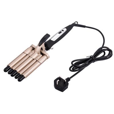 China High temperature protection large electric wave wave splint curling iron five-tube gold curling iron for sale