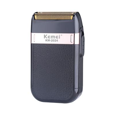 China Twin Blade KEMEI ABS Reciprocating Electric Shaver USB Rechargeable Roll Trimmer for sale