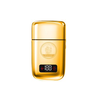 China Hot Sale Twin Blade Electric Anti Pinch Hair Product Gold Metal Body Shaving Kemei Km-Tx3 Usb Charging Swapping Razor for sale