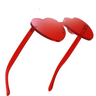 China European Sports Sunglasses Thick Candy Color Heart Sunglasses And American Trend Frameless PC United Ocean Glasses for sale