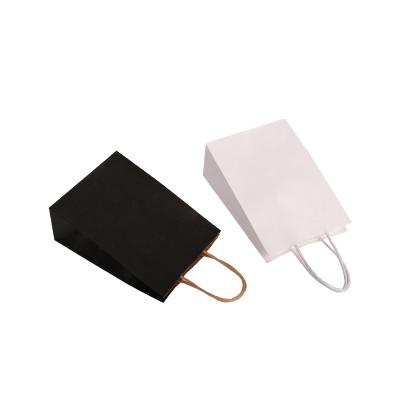 China Recycled Materials Customized Black Colorful Customized Famous Brands Logo Packaging Kraft Paper Bag With Rope Handle Cloth For White Gift Birthday for sale