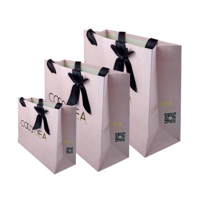 China Recycled Materials Wholesale Custom Logo Jewelry Fashion Cardboard Box High End Recyclable Retail Luxury Paper Shopping Bags With Iron Chain Handle for sale