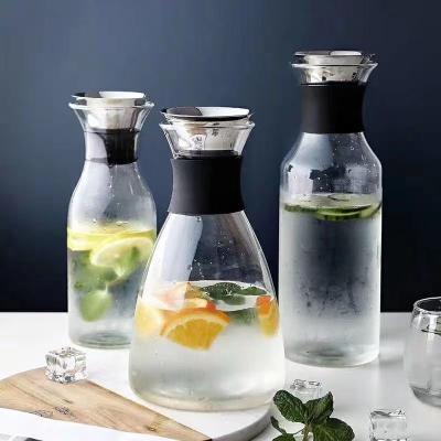 China Viable Chinese Glass Jug Juice Handle Transparent Custom Handmade Cold Water Jug Carafe Bottle Ice Tea for sale