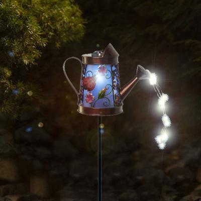 China Luxury Polycrytalline Silicon Iron Watering Can Solar String Lights Metal Decoration Stake For Garden Patio Countyard for sale