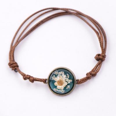 China Trendy Charm Friendship Ladies Jewelry Hawaiian Bracelet Sex, Rope Knot Flower Braided Bracelet for sale