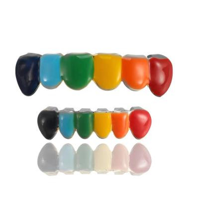 China Hot Selling Hiphop Rainbow Six Color Punk Canine Teeth For Holiday Decoration Hops Gold Plated Oil Teeth Grillz for sale