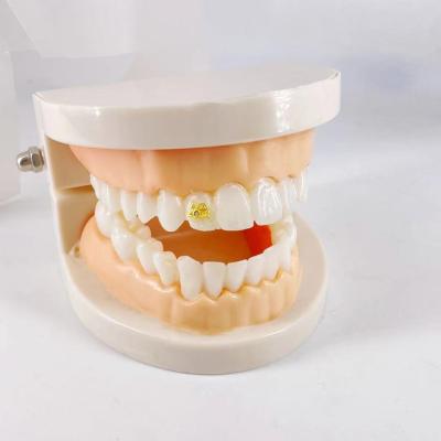 China Hiphop Putian hot selling European and American hip-hop wind metal teeth can be hot bonded gold plating jewelry metal bands for sale