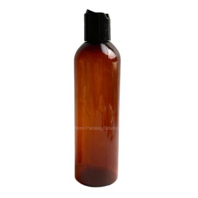 China Boston Shape Fast Ship 250ml Amber Color PET Plastic Bottle With Disc Top Cap For Body Lotion for sale