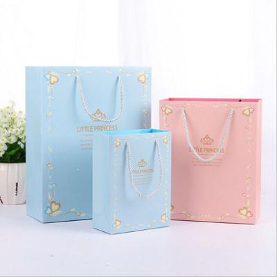 China Fashion Handmade Wholesale Paper Bags Packaging Gift Clothes Hot-Stamping Logo Rope Handle Bag for sale