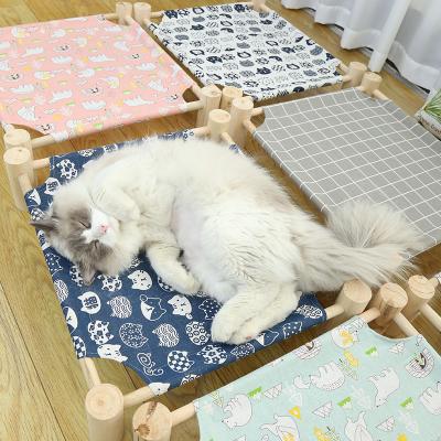 China Sleeping pet wood camping bed, cat dog solid wood bed, universal in all seasons for sale