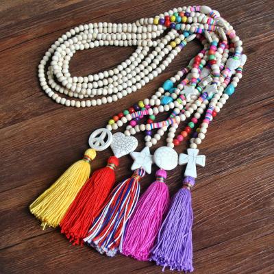 China Fashion Polymer Clay Wooden Beads Turquoise Necklace Long Heart Wooden Bohemian Cross Pendant Star Beads Tassel Necklace for Women for sale