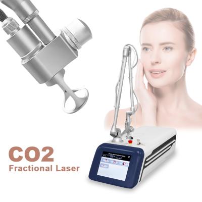 China Skin Rejuvenation Portable Co2 Fractional Laser Machine 10600nm For Wrinkle Stretch Mark Removal for sale