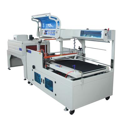 China Multi-function Accessories Automatic Shrinking Cutting Sealer Bag Wrapping PE Film Packaging Machine for sale