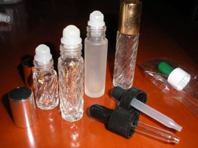 China 1 inch 0.05mm Perfume Roll On bottles with Holder For Cosmetic Packaging for sale