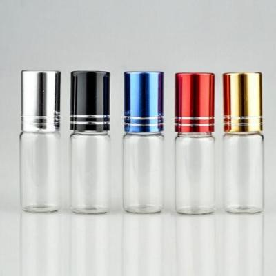 China Clear Roll Essential Oil Bottle 5ml 10ml Glass Round Shape Roller Ball Bottle à venda