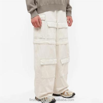 China Custom Anti-wrinkle OEM beige zipper at knees shorts multiple pockets oversized cargo pants for men for sale