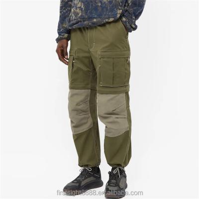 China Distinct Anti-wrinkle OEM Custom At Knees Loose Loose Color Block Patch Pockets Cargo Pants For Men for sale