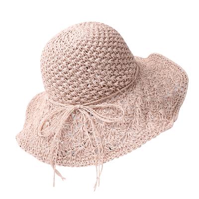 China New Large Eaves Summer Solid Color Handmade Sun Straw Beach Hats Fashion Straw Hats Comfortable Female Foldable Sun Protection for sale