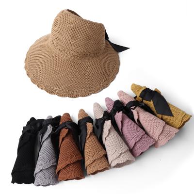 China New Comfortable Knitted Straw Hat Visor Straw Sun Visor Hat Ladies Summer Bowknot Large Empty Eaves Sunscreen Outdoor Hats for sale