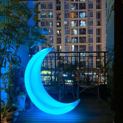 China Event decor glowing plastic led moon swing en venta