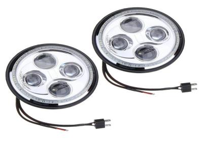 China OSRAM LEDs 7 Inch Round Vehicle Off Road Led Headlights H4 for Jeep Wrangler for sale