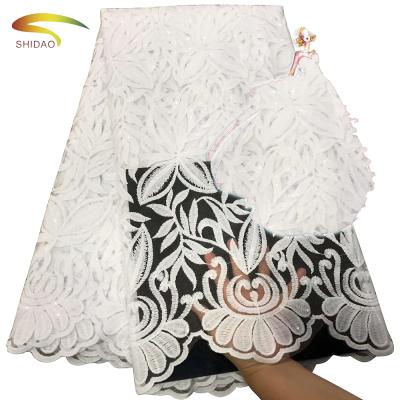 China 2019 Sequin Nigerian Silk Bridal Fabric Embroidered French Tulle Lace Milk Lace Fabric Viable For Wedding for sale