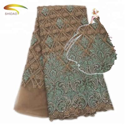 China Sustainable Heavy Handmade Gold Embroidery Beaded Lace Fabric For French Dress for sale