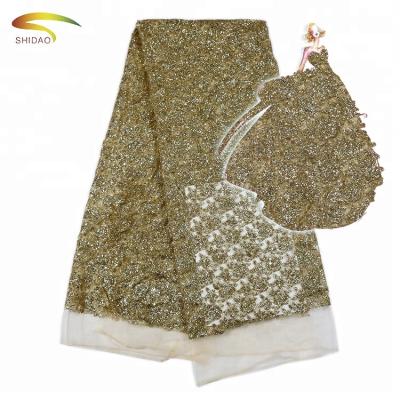 China 2017 Shinning Africa Viable Gold Flower Embroidery Glitter Powder Lace Fabric For Dress Dresses for sale