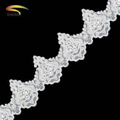 China Viable Top Selling Lace Trim Sequins Embroidery White Floral Wedding For Clothing Lace Sewing Trimming for sale