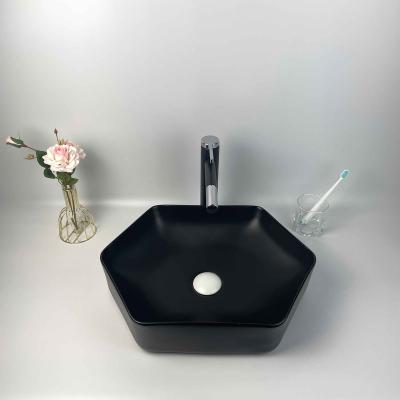 China Hot Sale Modern Hexagonal Luxury Western Style Single Lavabo Wash Top Table Black Ceramic Bathroom Sink New New for sale