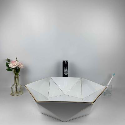 China Hot Selling Single Lavabo Modern Hexagonal Luxury Western Style Wash Top Table Bathroom Single Ceramic Sink New for sale