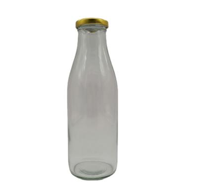 China Milk Wholesale Glass Milk Bottle Returnable Reusable Packaging With Lids Milk Glass Vintage Style With Cap for sale