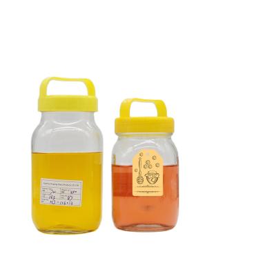 China Beverage Custom 750ml Clear Mouth Glass Honey Wide Storage Jar Glass Bottles For Water With Plastic Lid for sale