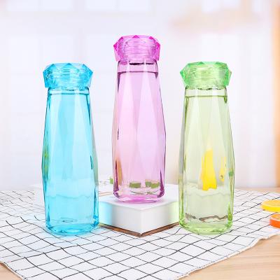 China Beverage Good Selling Wholesale Cheap Empty Glass Beverage Bottles Colorful Glass Water Juice Bottle With Unique Screw Lid In Stock for sale