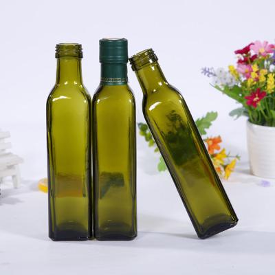 China 100ml viable 250ml 500ml 1 liter empty clear green glass bottle for olive oil, flaxseed oil, jojoba oil for sale