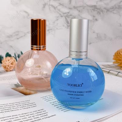 China Manufacturer Personal Care Perfume Bottles 100ml Round Ball Perfume Glass Bottle With Pump Spray for sale