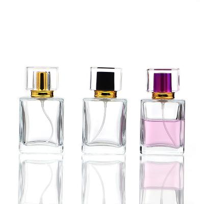 China Best Selling Clear Custom 50ml Rectangle Personal Care Glass Liquid Perfume Bottles for sale