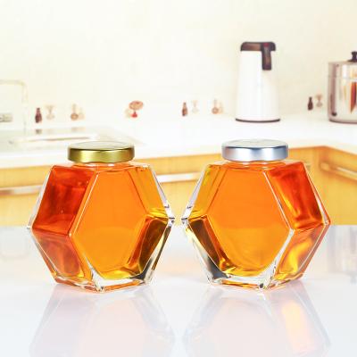 China Healthy 500g Hexagon Glass Jars Honey Bottle With Metal Lid Wholesale for sale