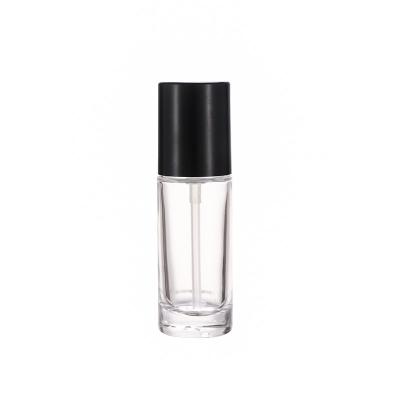 China 30ml Luxury Luxury Glass Bottle With Base Pump for sale