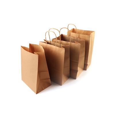 China Manufacturer Disposable Wholesale Custom Logo Brown Craft Packaging Gift Recycle Bag Kraft Paper Shopping Bags With Handles for sale