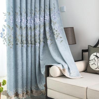 China Fire Retardant New Chinese Modern Chenille Relief Embroidered Curtains Living Room Bedroom Blackout Curtains for sale