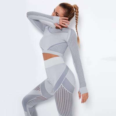 China Custom 2021 Women Sportswear Breathable Hollow Casual Yoga Tops Long Sleeve Shirt Gym Crop Top for sale