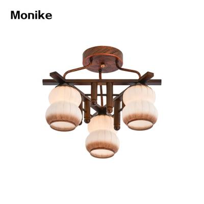 China Surface Mounted New Model Villa Home Southeast Asia Style Decorative Iron Wooden LED Ceiling Lamp for sale