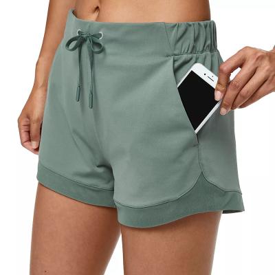 China Custom Xuhui Logo Women's Shorts QUICK DRY Green Quick Dry Fitness Summer Sports Shorts With Pockets for sale