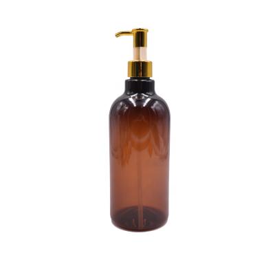 China Custom Bottle 500ml, Gold Luxury Oil Pump Empty Shampoo Hair Conditioner Shampoo Amber Plastic Bottle for sale