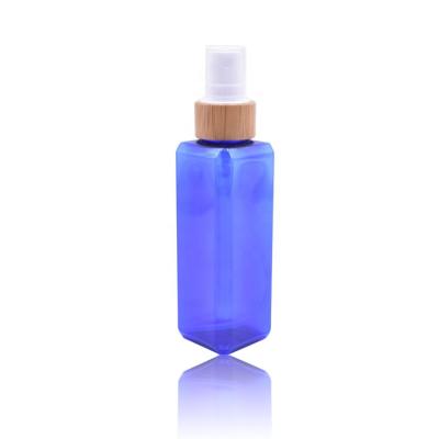 China High Quality Plastic Bottle 100ml Empty Blue Pet Lotion Toner Square Bottle With Bamboo Sprayer for sale